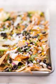 These easy and healthy shredded chicken nachos are a super easy weeknight meal. Sheet Pan Shredded Chicken Nachos Easy Weeknight Dinner Idea A Sweet Pea Chef
