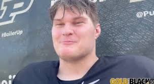 Purdue punter Jack McCallister's silver cleats have produced golden results 