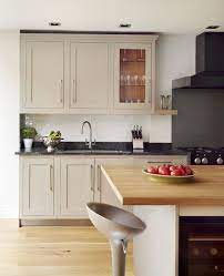 Hand Painted In Warm Biscuit Tones This Classic Style Framed Kitchen Has Been Paired With A Stylish B London Kitchen Design Bespoke Kitchens Kitchen Interior