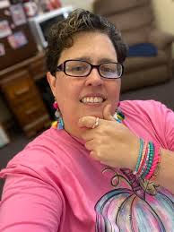 Matching pink cardigan and earrings for tonight's live