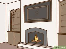 A fireplace works as the focal point in a living room. How To Arrange Furniture Around A Fireplace With Pictures