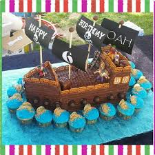 Nettie S Cake Creations On Instagram Pirate Ship Cake And Gold Coin Cupcakes With Buttercream Pirateshipc Pirate Ship Cakes Pirate Birthday Cake Pirate Cake