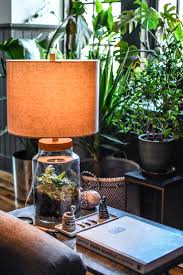 Designer Hilton Carter S Bodacious Baltimore Pad Teems With Over 300 Plants Homemade Lamps Vintage Lamps Terrarium Diy