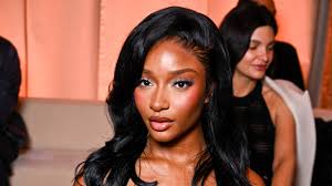 Ayra Starr Wore a Latex Cut-Out Little Black Dress at Paris Fashion Week —  See Photos