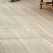An applied metallic element makes the light reflect off its surface. Travertine Look Porcelain Tile The Tile Home Guide