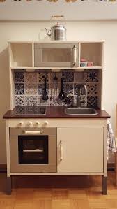 I thought it could do with a little modern glow up and love. Ikea Duktig Children Kitchen Makeover Another Makeover For Inspiration Love The Tiles Childr Ikea Kids Kitchen Ikea Childrens Kitchen Ikea Play Kitchen