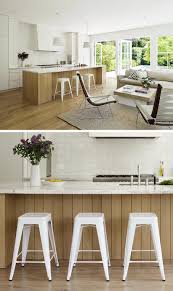 Light oak cabinets solid wood kitchen cabinets white wood kitchens kitchen cabinet design kitchen designs kitchen cupboards kitchen ideas kitchen color trends kitchen colour schemes. White Kitchen Warms Up With A Wood Island