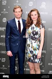 Claudia Jolly and Sam Reid arriving at the Summer Party 199 for The Old Vic  held at The Brewery, London Stock Photo - Alamy