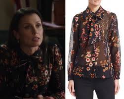 When a video surfaces of cops being harassed by a group of people at a housing complex, frank orders a raid to round up anyone with an outstanding warrant, against garrett's (gregory jbara) advice. Blue Bloods Season 9 Episode 9 Erin S Floral Neck Tie Blouse Shop Your Tv