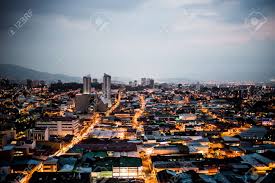 The population of this city is probably half of the whole country. Panoramic View Of The City Of San Jose Costa Rica At Sunset Stock Photo Picture And Royalty Free Image Image 92574612