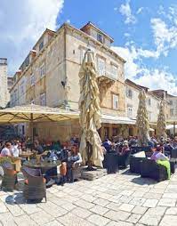 Walk around and explore the alleyways of this unusually shaped plaza. Kavana Pjaca Hvar Home Facebook