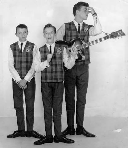 Twins Maurice and Robin Gibb of the Bee Gees, born today in 1949, with  their older brother and bandmate, Barry Gibb. ⁠ Forming a skiffle group in  1955 called The Rattlesnakes during