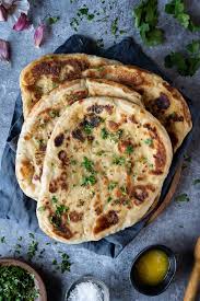 Vegan Naan Bread These Soft Vegan Flatbreads Are Perfect For Serving Alongside Curry And Are Easy To Make Too Soft Fluff In 2020 Vegan Naan Naan Recipe Garlic Naan
