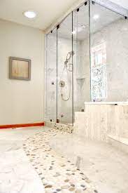 Bring the outdoors inside with a river rock floor in your bathroom. Marble Bathroom Floor With River Rock Contemporary Bathroom Seattle By All Tile Houzz