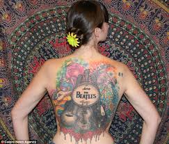 Pepper's lonely hearts club band, which was released earlier in the. Beatles 50th Anniversary Fan Jenn Cormack Gets Giant Back Tattoo Dedicated To The Band And Wants Paul Mccartney To Sign It Daily Mail Online