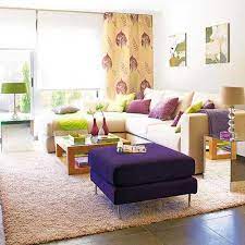 Purple wallpaper and wood panels line the walls. Purple Red And Light Green Color Combinations That Differentiate Modern Living Room Designs Cozy Living Room Design Colourful Living Room Casual Living Room Design