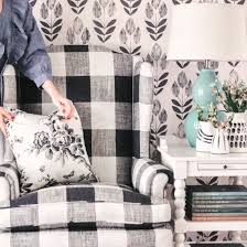 There are a fireplace and a tv on top of it as well. Black White Farmhouse Living Room Dwellinggawker