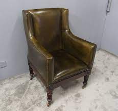 This chair features an armless construction. Rosewood And Olive Green Leather Library Chair Antiques Atlas