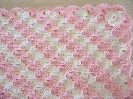 This easy baby blanket is knit in three strips using two colors and then sewn together. Pin By Dianne Muzalewski On Love Pink And White Baby Girl Crochet Blanket Crochet Baby Patterns Baby Blanket Crochet Pattern