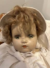 Identifying 90 year old vintage doll?