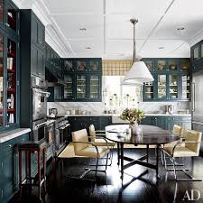 When i also consider the butcher block counter top that i'm planning to replace the existing painted ones, i think this combo is my favorite. Painted Kitchen Cabinet Ideas Architectural Digest