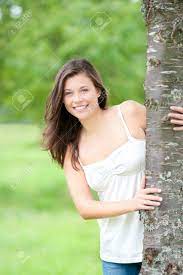 Lassies adore playing with games that are dirty. Outdoor Portrait Of A Cute Teen Behind A Tree In Summer Stock Photo Picture And Royalty Free Image Image 10183559