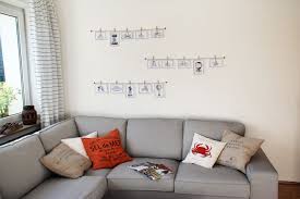 Fotowand In Verbindung Mit Naturbelassenen Holzklammern Und Einem Seil Aus Naturhanf Holzklammern Fotowand Postkarten