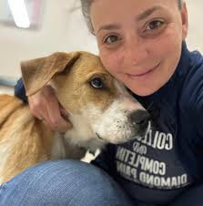 Today is #NationalPopcornDay! We have our very own Popcorn, an adorable  black Lab puppy, who will one day be a superhero!