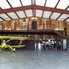 It D Be Pretty Cool To Live In A Restored Aircraft Hanger Airplane Hanger House Metal Building Homes Home Building Design
