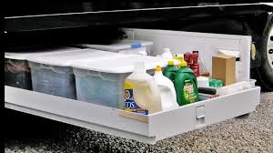 The gas flows up through the riser, directed downward by the cap through the annular space between riser and cap. How To Organize An Rv Basement Youtube