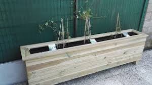 Fabrication d'un bac à fleur uniquement à partir de palettes. Mini Tuto Fabriquer Un Bac A Fleurs En Lames De Terrasse Youtube
