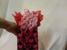 You will need tissue paper, the gift, ribbons or embellishments, a gift bag, and a card. How To Put Tissue In A Gift Bag Youtube