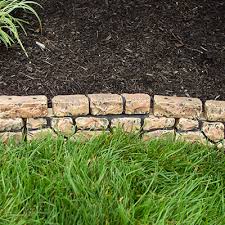 Length feature predrilled holes at either end for staking. Gardeneer Stonewall Faux Stone Border Edge Tan 117 L X 6 H At Bestnest Com