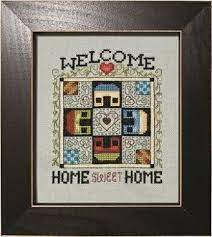 Model stitched over 2 threads on 30 ct. Stoney Creek Welcome Homeward Bound Quilt Block Cross Stitch Pattern 123stitch