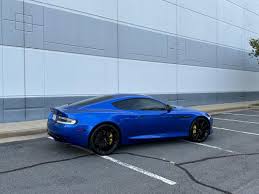 Image result for Concours Blue 2015 Aston Martin