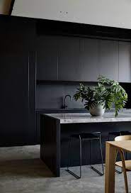 Stylish Modern House With Pool In Suburbs Of Melbourne Photos Ideas Design Modern Black Kitchen Modern Kitchen Design Modern Kitchen