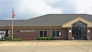 The bloomington il branch is located at the intersection of towanda avenue and east empire street, next to the post office in mclean county. Bloomington E Washington First Mid Bank Trust