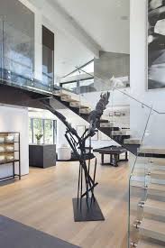 Natural light filters through this clean, white entryway, making it feel even brighter. Most Stylish Contemporary Stair Railing 333 Images Artfacade