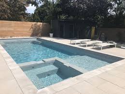 Permacon City Slab In Sterling Grey And Ultimate Fibreglass Glass Pool In Silver Grey Travertine Pool Decking Small Swimming Pools Rectangle Pool