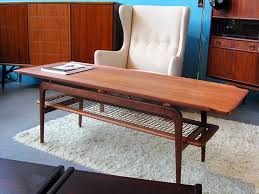 Danish modern teak triangle side table with rack $ 1,825 $ 1,575; Teak Floating Top Coffee Table Mid Century Modern Coffee Table Mid Century Modern Furniture Coffee Table