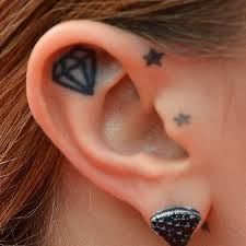 Cara delevingne 34 of the prettiest celebrity tattoos that the artists behind rihannas cara de. Cara Delevingne S 20 Tattoos Meanings Steal Her Style