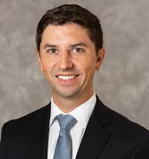 The Role of an EMBA During a Merger, Career Shift, and Covid-19:  Perspectives from Alum Jon Michael Thomas