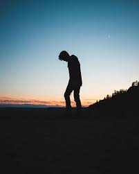 Boy standing under tree at sunset. Pin On Worship Art