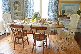 Rustic country french farmhouse dining table featuring a bleached oak distressed finish with an aged patina. 8 French Farmhouse Dining Rooms Worth Lingering In
