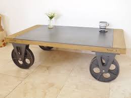 Complement your modern space with a high quality glass coffee table for a great price. Modern Industrial Rustic Wheeled Coffee Table