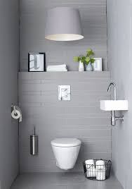 So Konnen Sie Ein Gemutliches Gaste Wc Gestalten Gaste Wc Gestalten Badezimmerlampen Und Badezimmer Innenausstattung