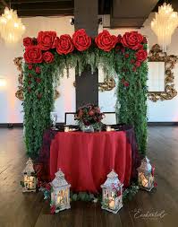 Top the cupcakes with frosting in the shape of a rose or other favorite red themed flower. Moody Red Rose Arch For Wedding Ceremony Backdrop Red Rose Wedding Wedding Arch Wedding Ceremony Backdrop