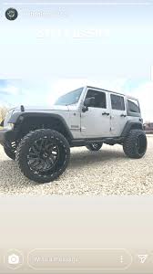 Black And Blue Tis Wheels 35x13 50r24 Tires With 24x14 Tis Wheels 4 Inch Lift Lifted Jeep Jeep Wranger Jeep Wrangler