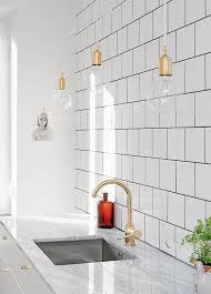 For larger spaces, consider using two. Using Dark Grout