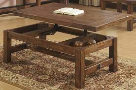 This piece which gets inspiration from a trunk would be a great choice. Solid Wood Coffee Table With Lift Top